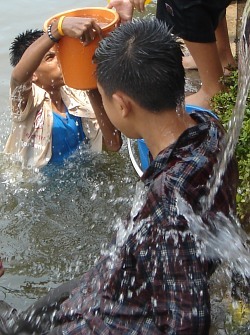 Songkran pouring water over your friends and others